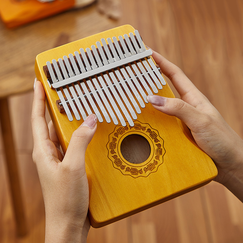 A Musical Instrument With Keys - Hluru 17 Key Kalimba Finger Piano