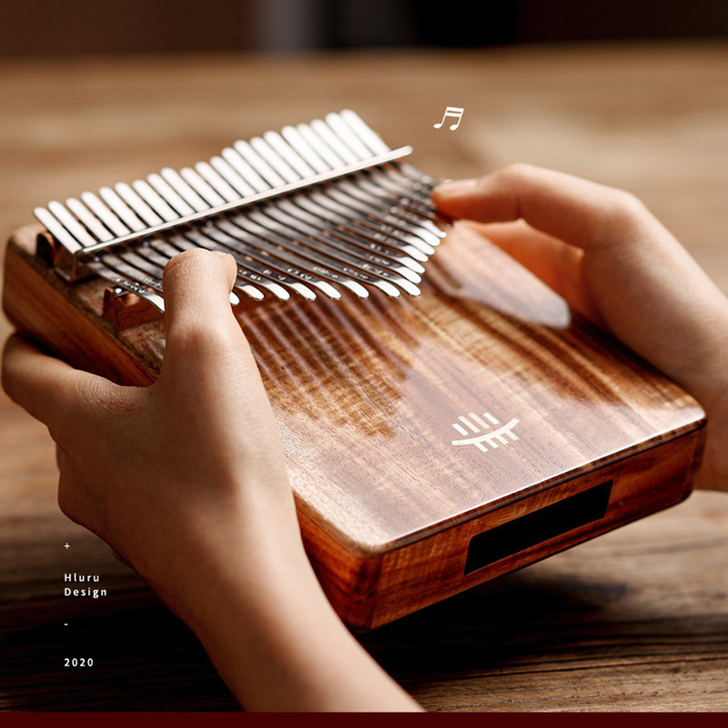 A Musical Instrument With Keys - guitar Kalimba 17 Keys with Hole